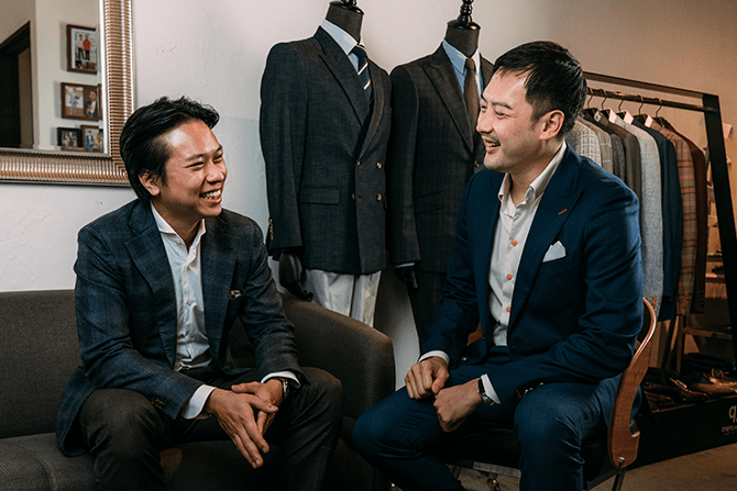 Chong Han San and John Chung having a conversation in his boutique